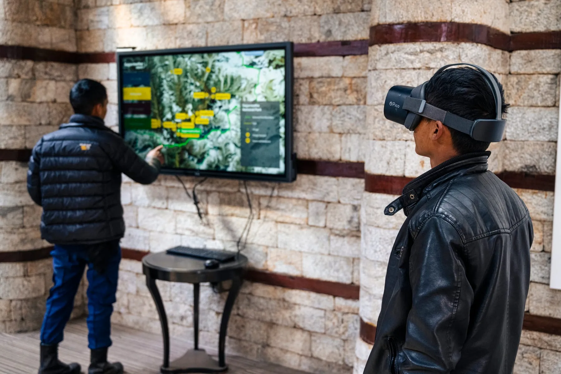 Visitors using VR and an interactive map at the Sagarmatha Next centre in Nepal